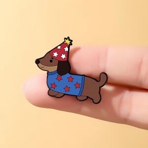 Cute Dachshund Enamel Pin – Brown Dog with Blue Sweater and Red Party Hat